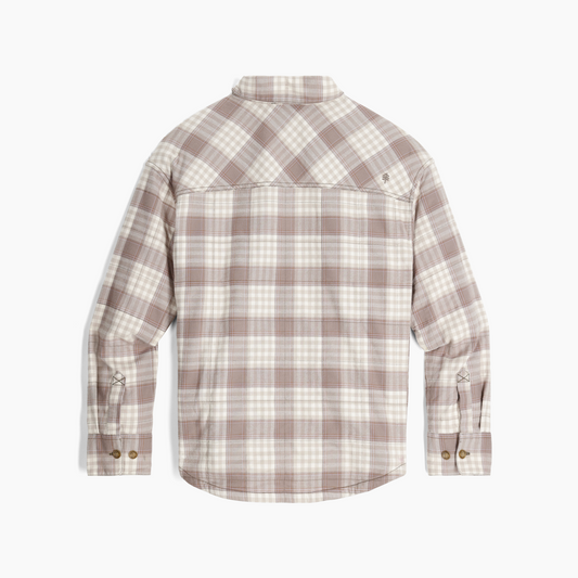 Product Image – Back view of the Royal Robbins Women's Vista Flannel Shacket in beige and white plaid with buttoned cuffs.