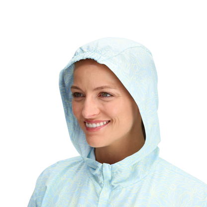 Woman smiles in a Royal Robbins Women's Salathe Sun Hoodie, UPF40+ sun protection, light blue, ONLINE ONLY.