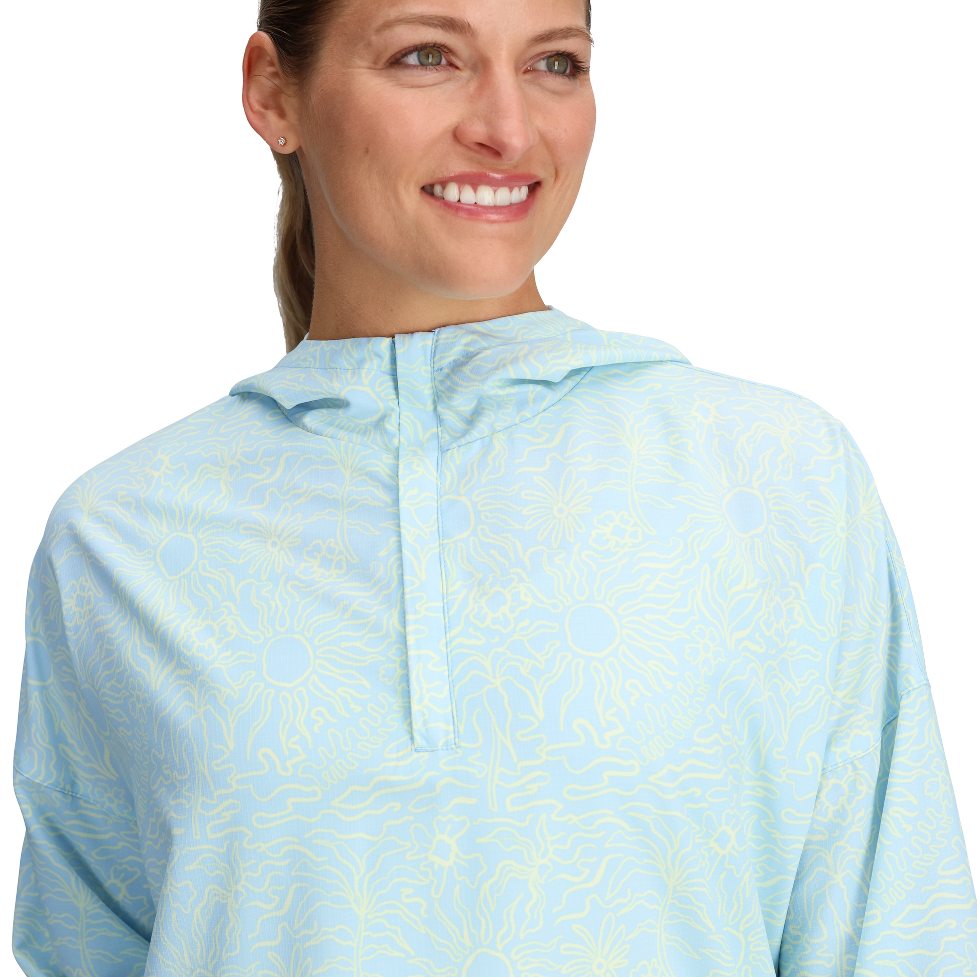 Woman smiles in a Royal Robbins Women's Salathe Sun Hoodie UPF40+ against a plain background.