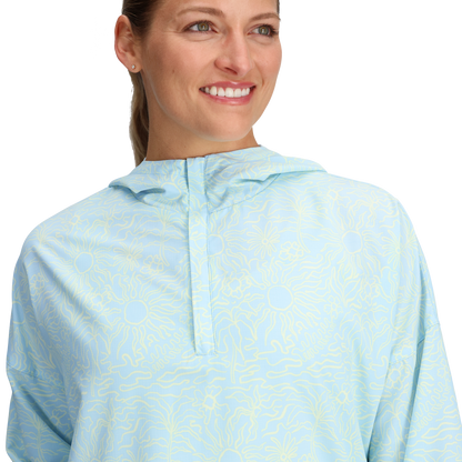 Woman smiles in a Royal Robbins Women's Salathe Sun Hoodie UPF40+ against a plain background.