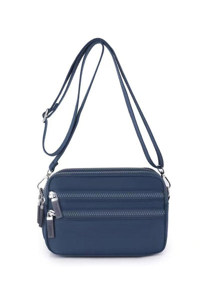 Alina's Triple Zip Square RFID Crossbody in navy, front view.