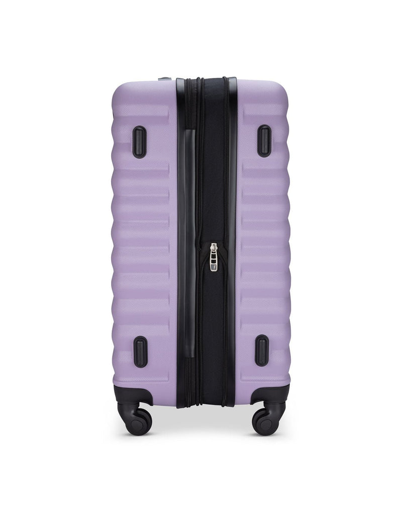 Side view of Atlantic Chaser Hardside 24" Expandable Spinner in powder lilac showing zipper expanded and feet on side of case
