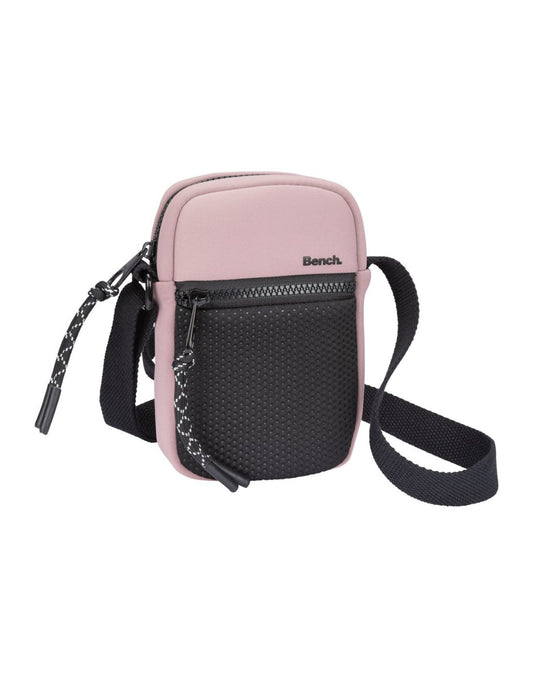 Product Image – Bench Aria Cell Phone Crossbody in pink with black front mesh zippered pocket and black strap and zippers