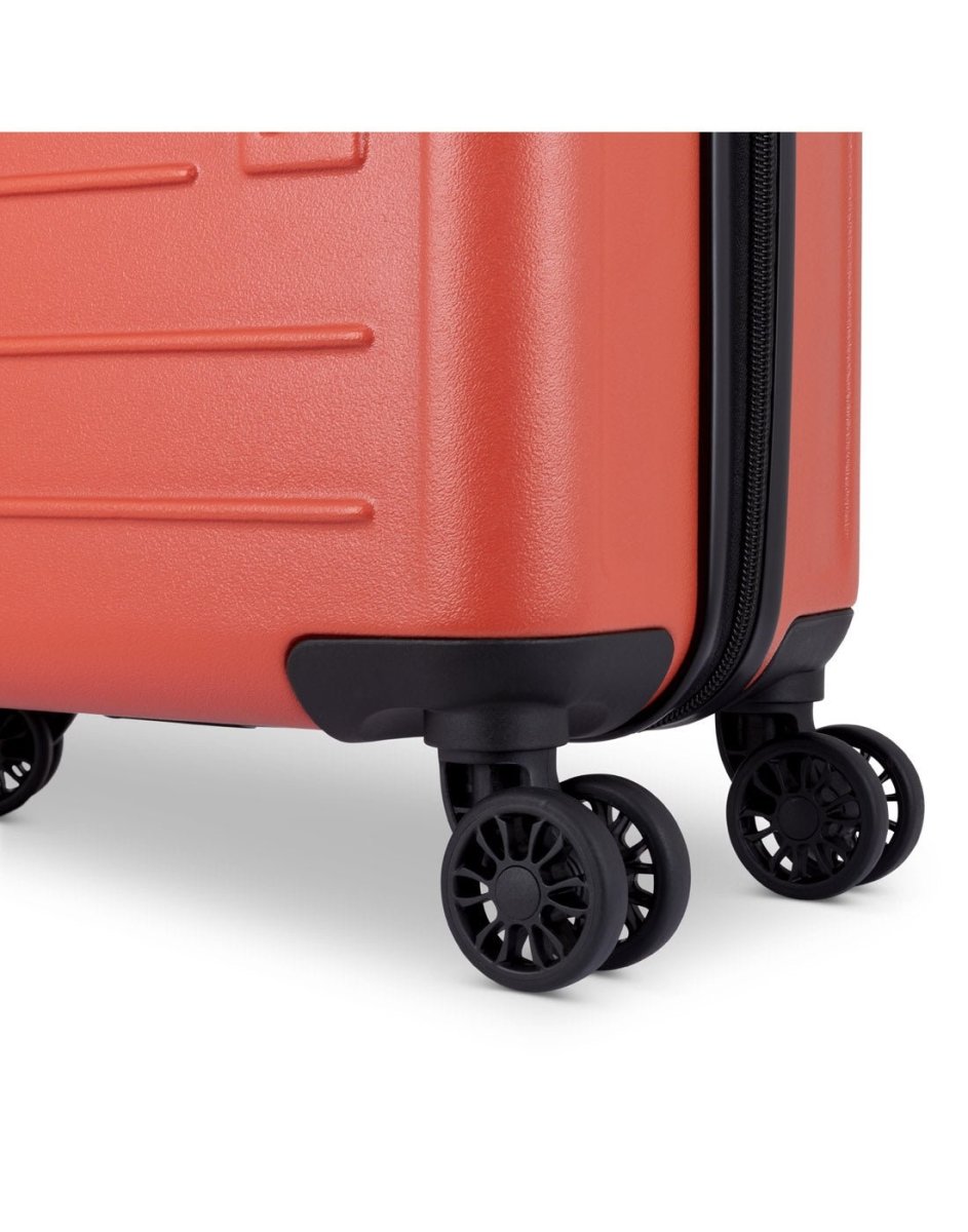 Close up of black spinner wheels on Bench Erasmos Hardside 19" Spinner Carry-on, burnt orange