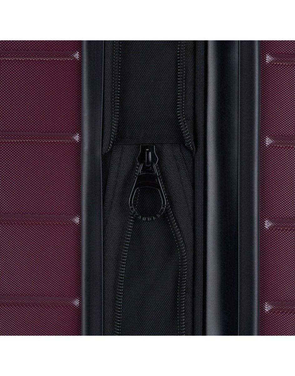 Bugatti Hamburg 28" Hardside Expandable Spinner in Red Lacquer, close-up view of the zipper-release expansion system. 