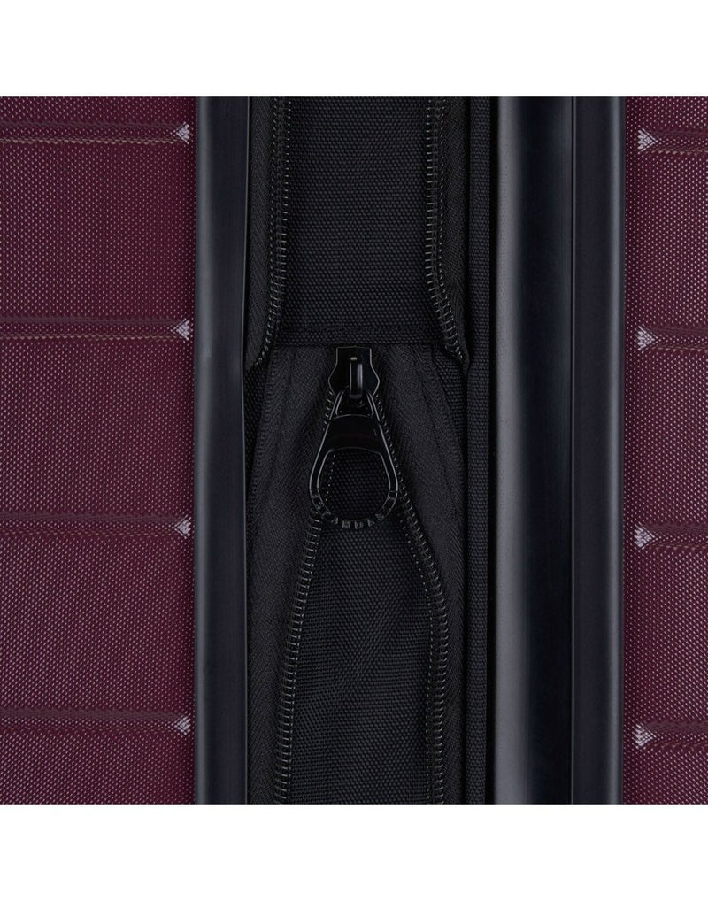 Bugatti Hamburg Hardside Carry-on Spinner in Red Lacquer colour, close-up view of the  zipper-release expansion system that provides 20% more packing space.