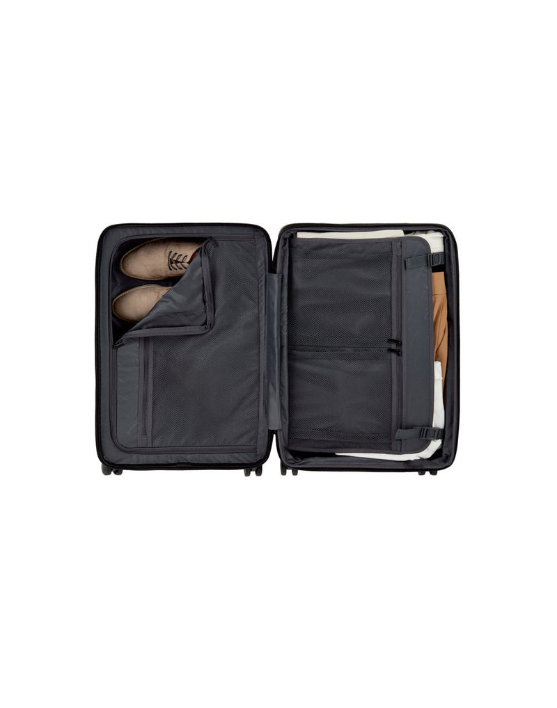 Bugatti Munich Hardside Carry-on Spinner in black, opened up to show the interior storage compartments and zipper pockets.