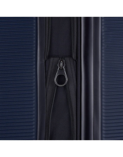 Bugatti Wellington Hardside 24" Expandable Spinner in Navy, close-up view of  zipper-release expansion system.