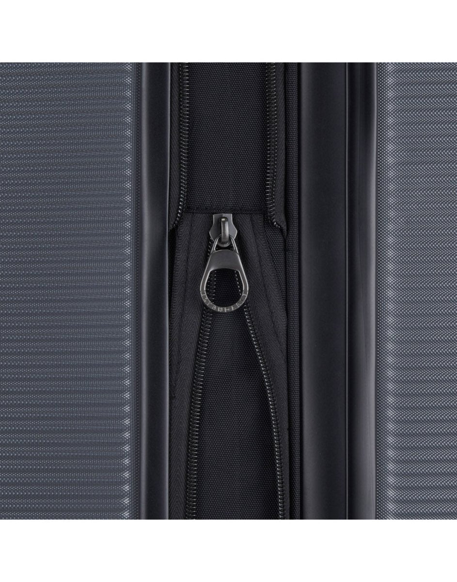 Bugatti Wellington Hardside Carry-on Spinner in Pewter colour, close up view of the zipper-release expansion system.