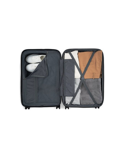 Bugatti Wellington Hardside Carry-on Spinner in Navy, un-zipped showing the interior of the carry-on.