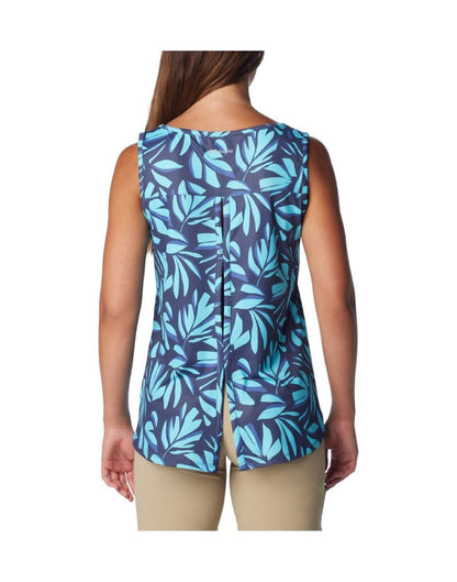 Back view of a woman wearing Columbia Women's Chill River™ Tank in Aquamarine Areca print. Showing the back venting.