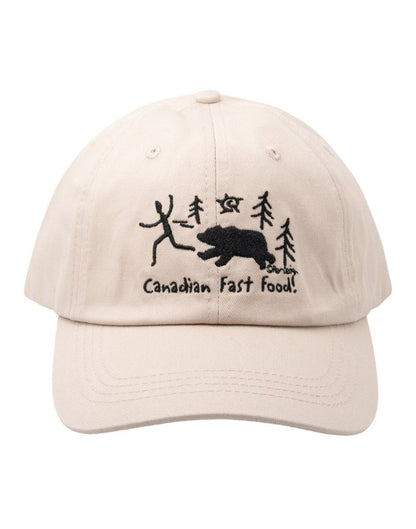 Tan baseball cap with black image of bear chasing a person with words Canadian Fast Food below