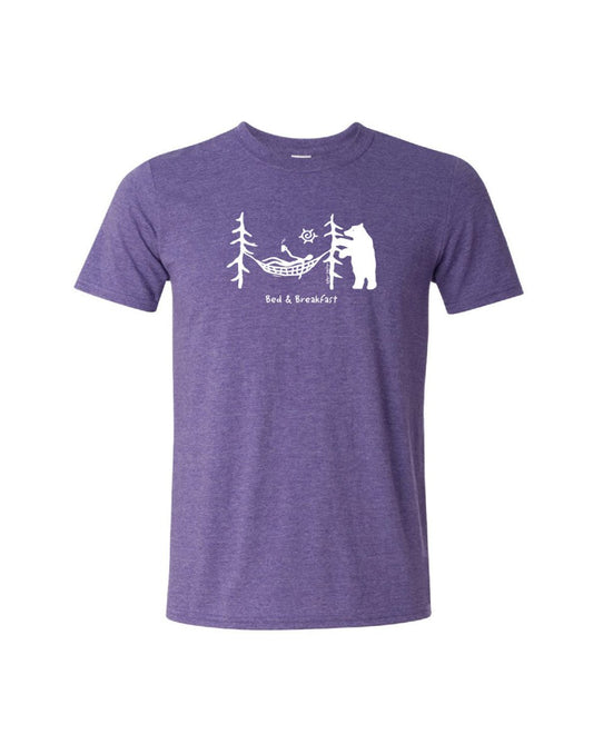 Product Image – Unisex Soft Style T-Shirt in purple heather colour with white image of bear beside trees with person in a hammock and words Bed & Breakfast below