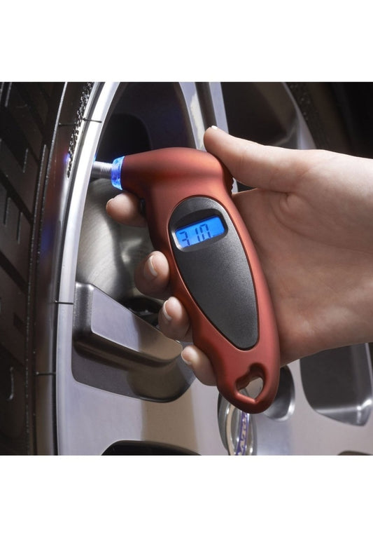 Product Image – High road digital tire gauge in use on a tire front view