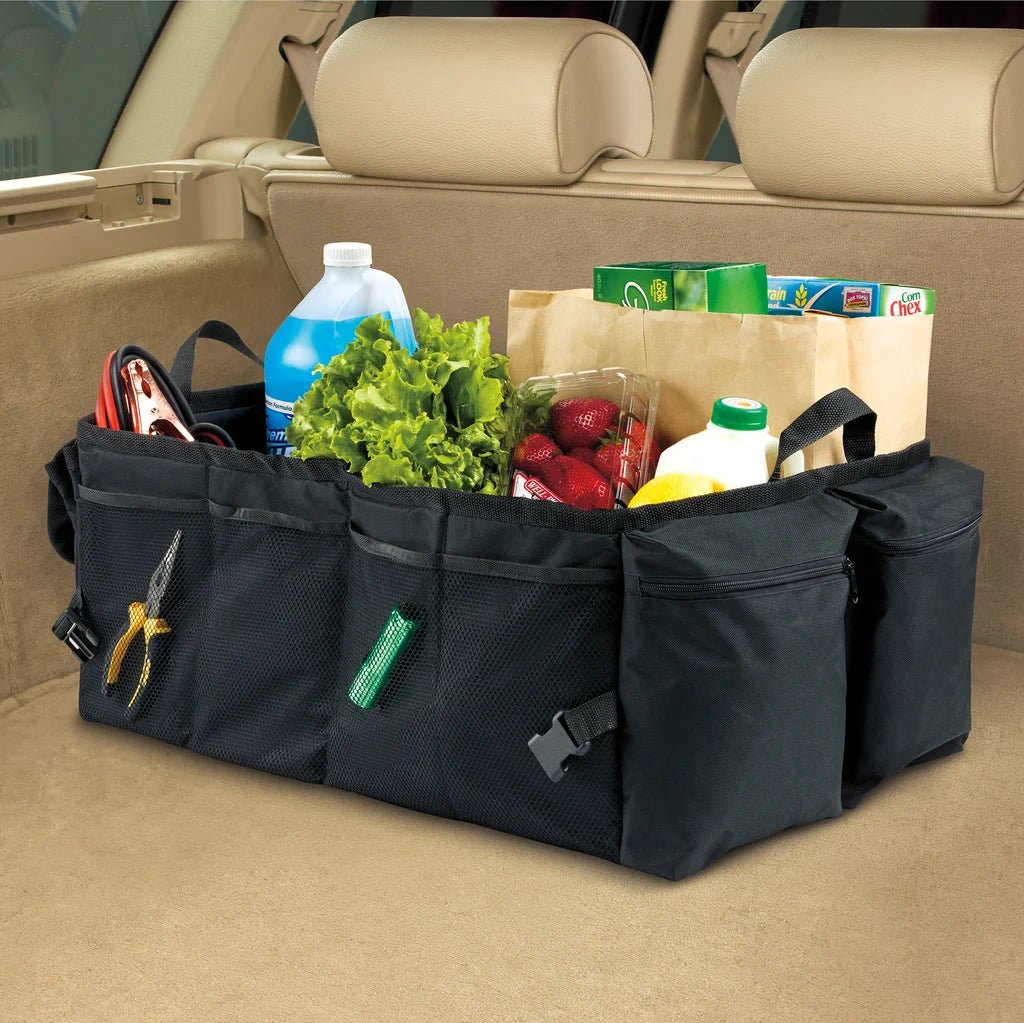 Lifestyle image of High Road® Trunk & Cargo Organizer placed in the trunk of a car, filled with groceries and other items.