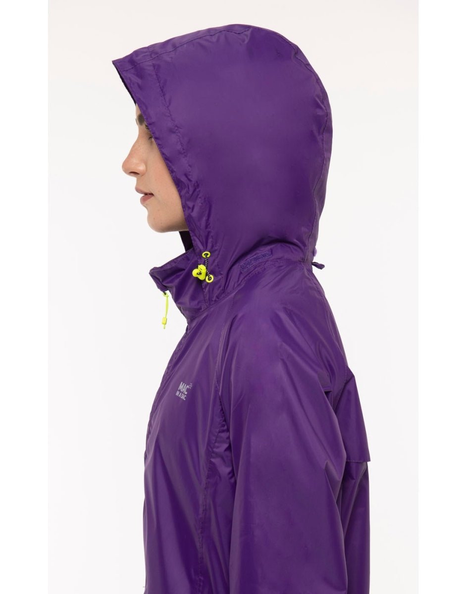 Close up of woman wearing Mac in a Sac Origin II Packable Waterproof Jacket in purple, with hood over her head.