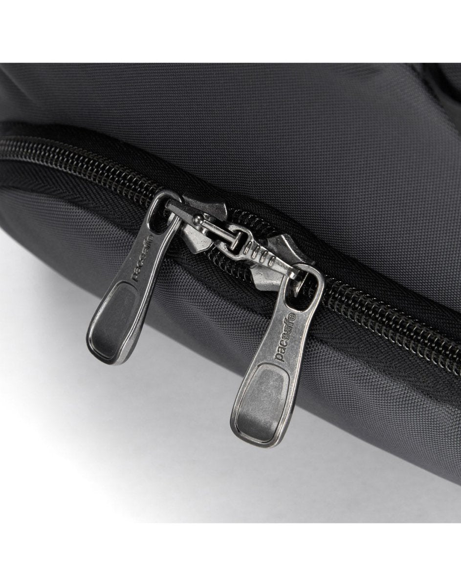 Close up of interlocking zipper pulls on slate bag