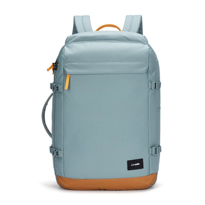 Pacsafe® GO 44L light blue carry-on backpack with orange accents, RFID pocket, and brown base.