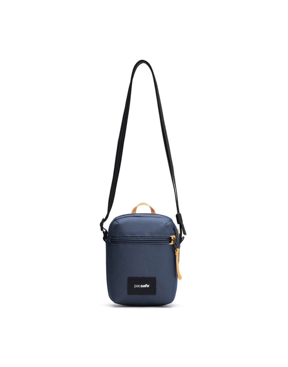 Pacsafe® GO Anti-Theft Micro Crossbody in coastal blue colour, front view with cut-resistant strap extended.