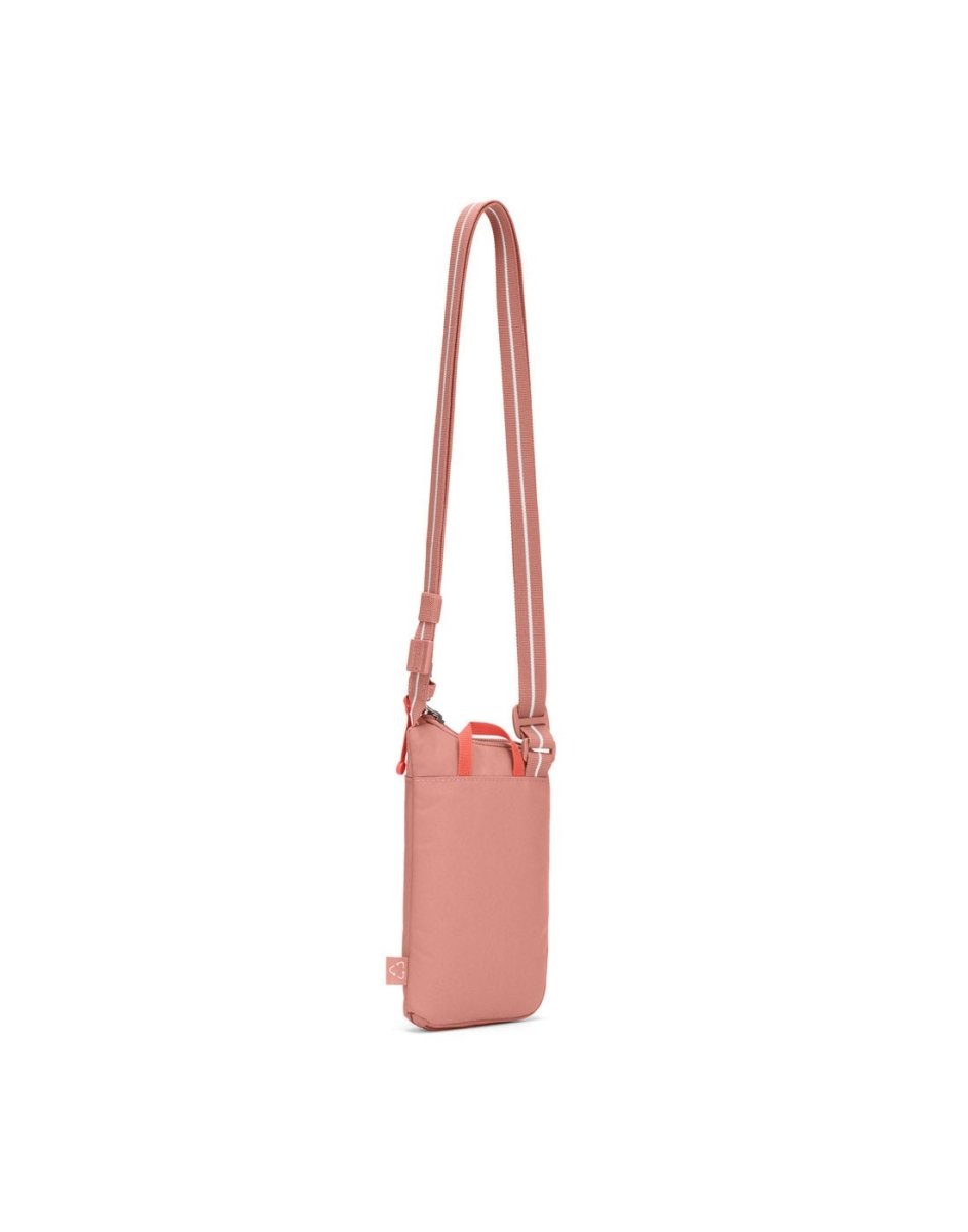 Pacsafe® GO Anti-Theft Tech Crossbody in rose colour back view with Carrysafe® slashguard strap extended.