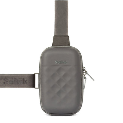 Close-up of the Rollink Mini Bag Go in Iron grey colour showing where the non-removable adjustable strap is attached to top and right side of bag.