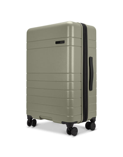 Roots Travel 24" Expandable Hardside Spinner in sage, side angle view.