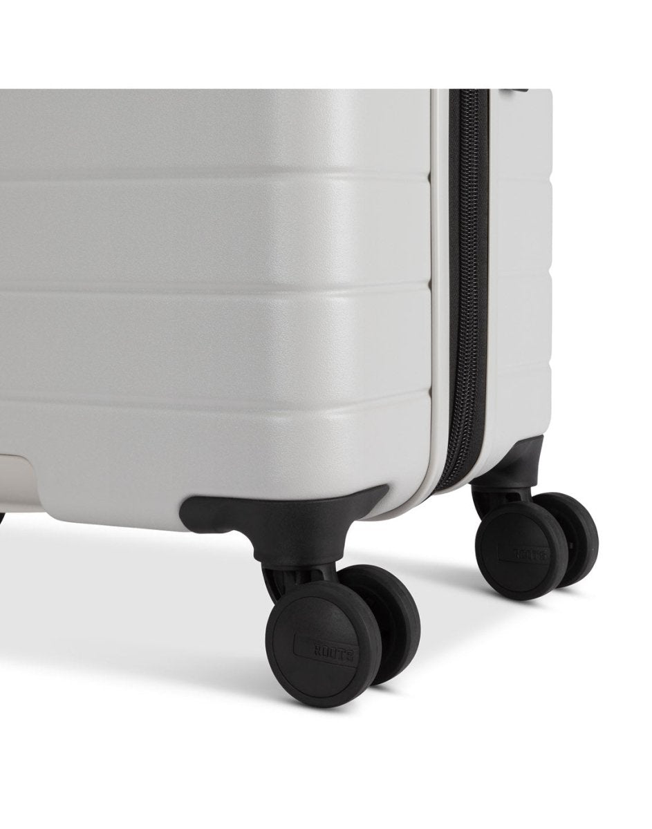 Roots Travel 24" Expandable Hardside Spinner in antarctica, close-up view of 2 spinner wheels.