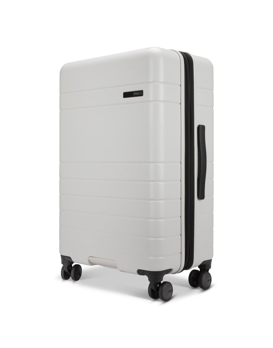 Roots Travel 24" Expandable Hardside Spinner in antarctica, side angle view.