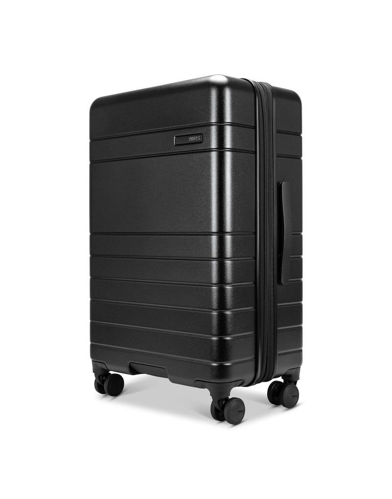 Roots Travel 24" Expandable Hardside Spinner in black, side angle view.