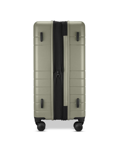 Roots Travel 28" Expandable Hardside Spinner in sage, expanded side view.