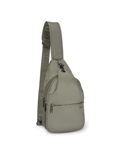 Roots Travel Sling Bag in sage, front angle view.