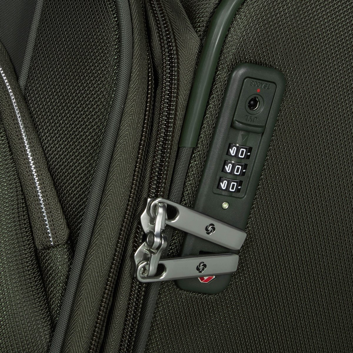 Close-up of the Samsonite Re-Lite Spinner Large, a lightweight suitcase with a TSA lock on two zipper pulls.