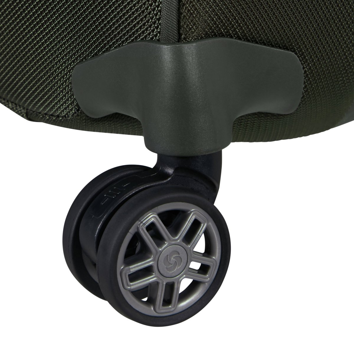 Close-up of Samsonite Re-Lite Spinner Medium's black double-wheel on green eco-friendly luggage.