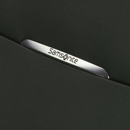 Close-up of a metal Samsonite logo on dark fabric, from the Samsonite Re-Lite Spinner Medium luggage.