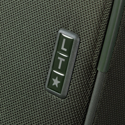 Close-up of Samsonite Re-Lite Spinner Medium with textured green recycled plastic and a 3-initial customization panel.