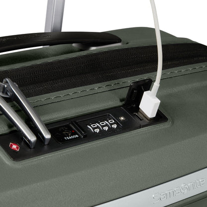 Close-up of the Samsonite Upscape Spinner Carry-On™ with combo lock, USB charging, and shock-absorbing wheels.