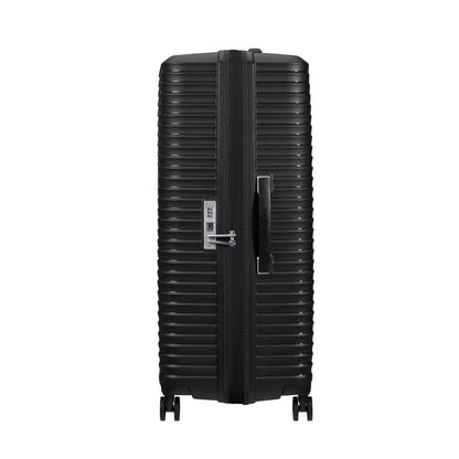 Samsonite Upscape Spinner Large: a black hard-shell suitcase with vertical ridges and shock-absorbing wheels.