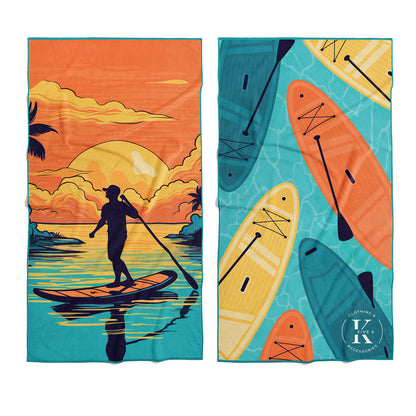 K5 Microfibre Beach Towels: sunset paddleboarding & colorful boards on blue water by K5.