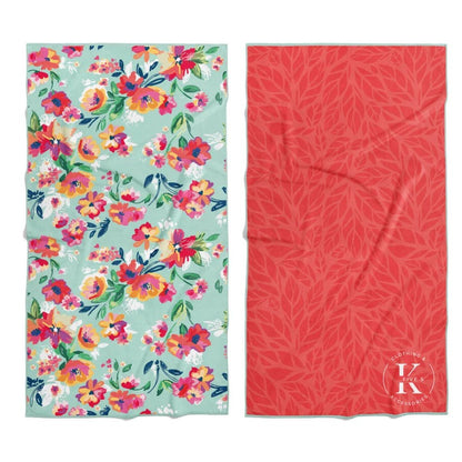 Two K5 Microfibre Beach Towels: ultra-absorbent, floral & red leaf designs, white K5 logo.