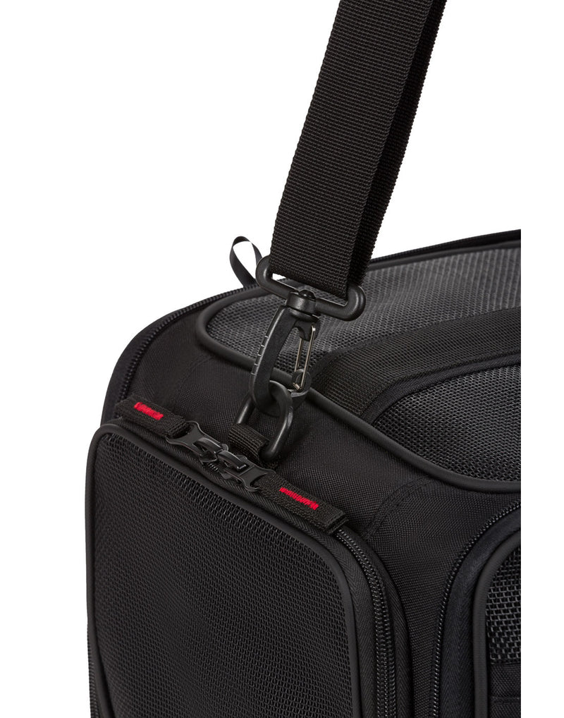 Swiss Gear Carry-on Pet Carrier, black, close up of detachable clip attached to shoulder strap.