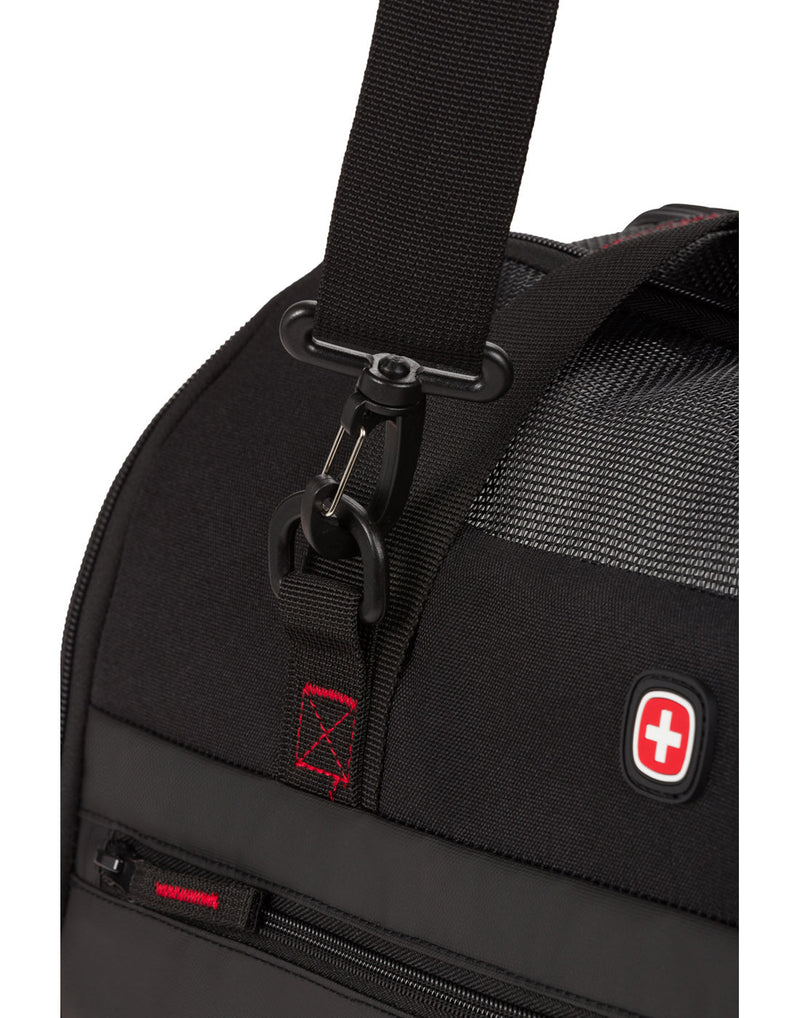 Swiss Gear Getaway Pet Carrier, black, zoom in of detachable clip attached to top strap.