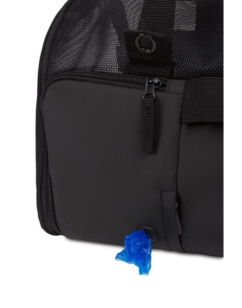 Close up of back zippered pocket with poop bag dispenser
