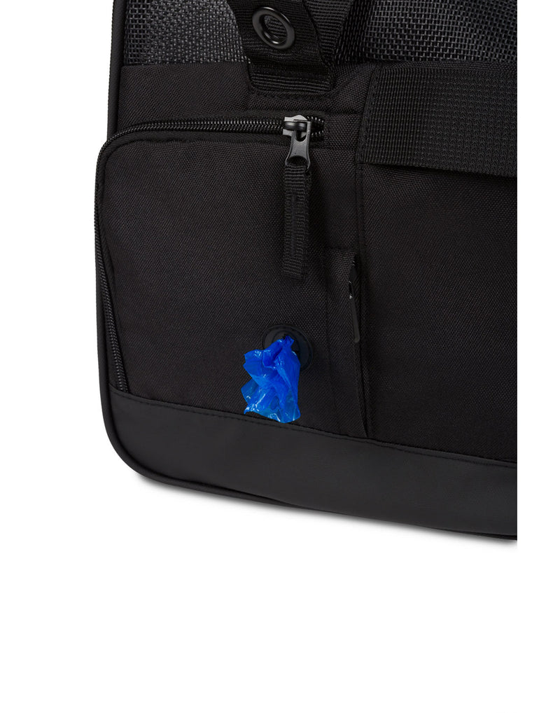 Close up of poop bag dispenser on back zippered pocket