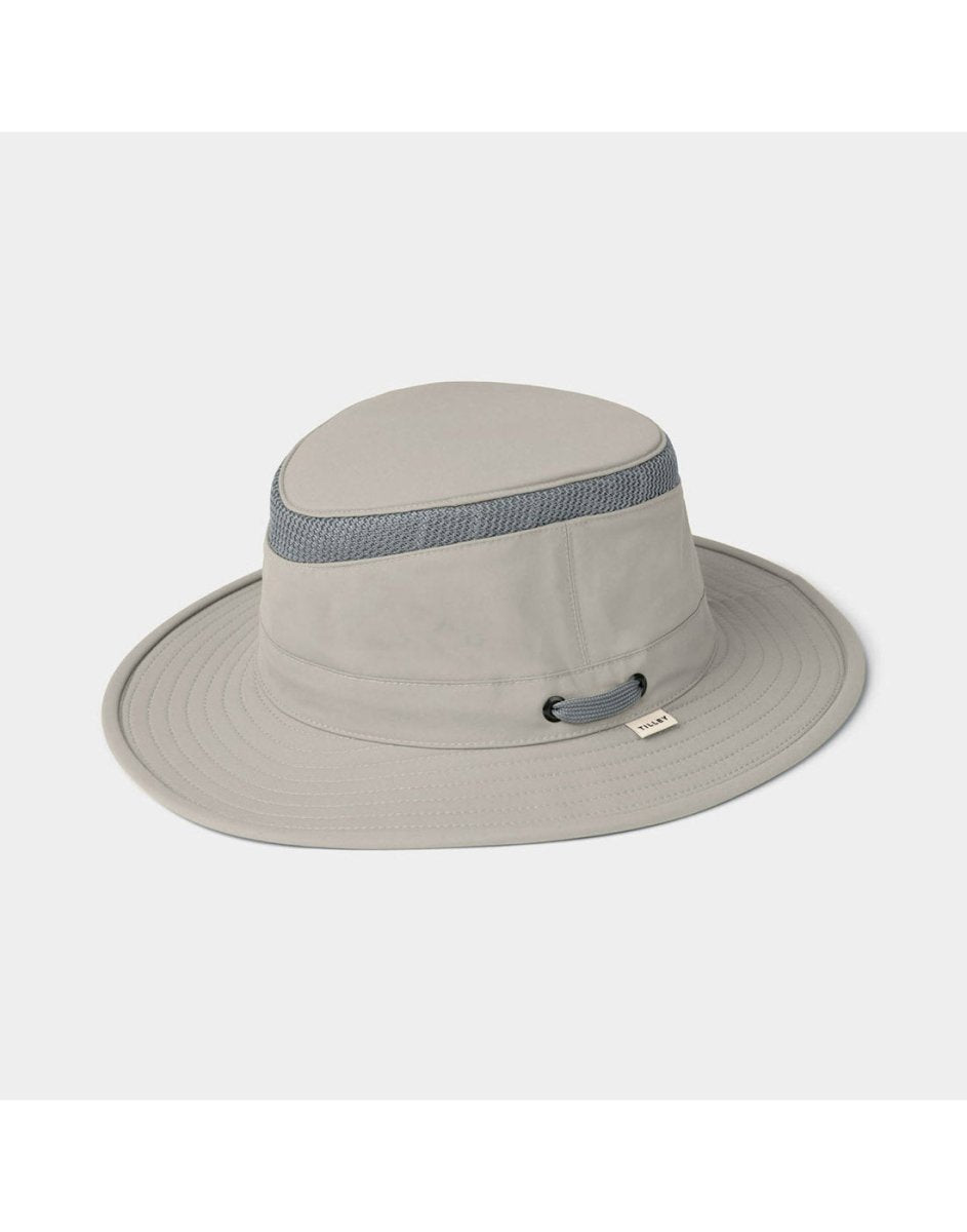 Light gray Tilley LTM5 Airflo® Hat with mesh band and chin strap loop, by Tilley, shown on white background.