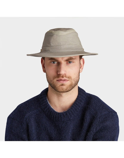 Man wearing blue sweater and the Tilley LTM6 AIRFLO® Hat in Khol, front view