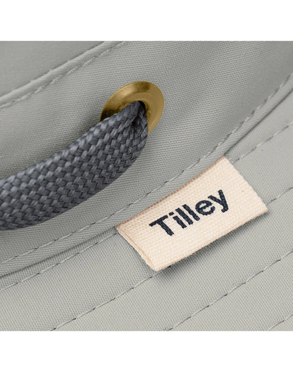 Close up of tag on brim of Tilley LTM6 AIRFLO® Hat in rockface, grey colour