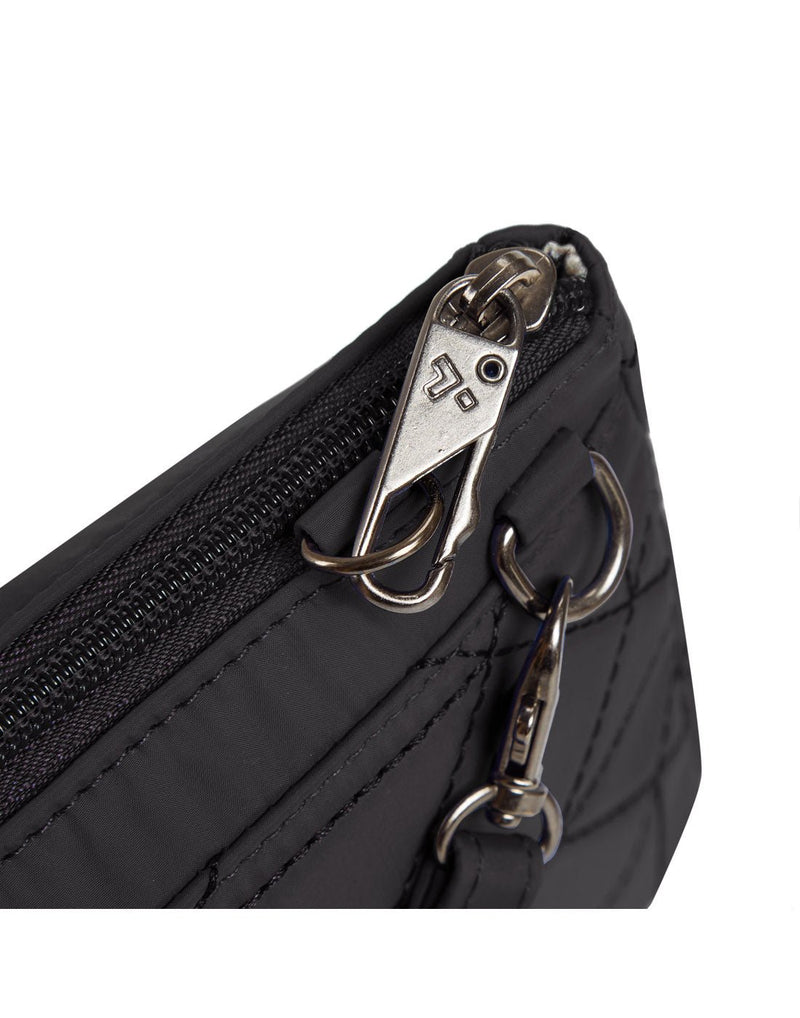 Close up of lockable zipper pull on black Travelon Boho Anti-Theft Clutch Crossbody