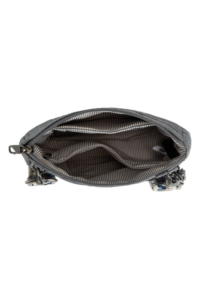 Interior view of the Travelon Boho Anti-Theft Clutch Crossbody in Grey showing the interior pockets. 