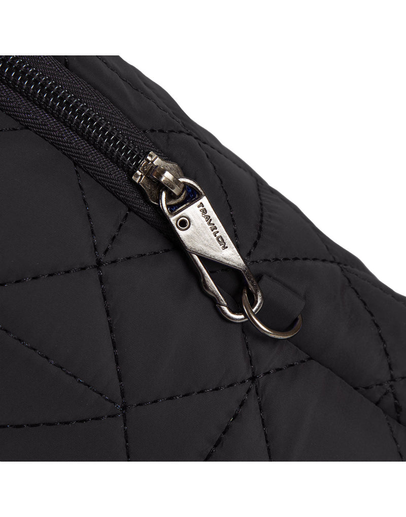 Close up of lockable zipper pull on black Travelon Boho Anti-Theft Insulated Water Bottle Tote
