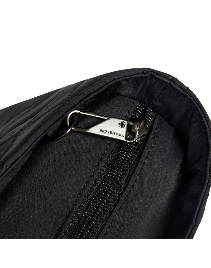 Close-up view of the Travelon Boho Anti-Theft Tote zipper's built-in Anti-Theft security system.
